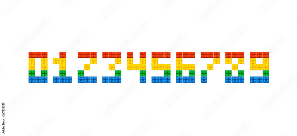 Numbers set 0, 1, 2, 3, 4, 5, 6, 7, 8, 9. Colorful plastic brick block figures isolated on white background. Numerals for poster, banner, print on fabric, kids greeting card. Numbers set 0, 1, 2, 3, 4, 5, 6, 7, 8, 9. Colorful plastic brick block figures isolated on white background. Numerals for poster, banner, print on fabric, kids greeting card.