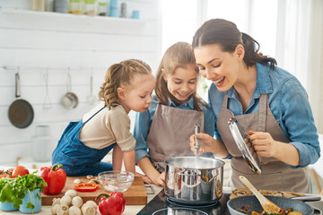 Happy family in the kitchen.
