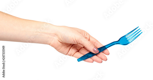 Hand with blue plastic fork, disposable utensil.