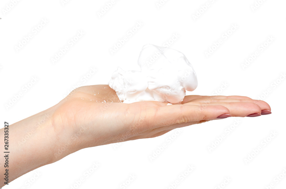 Hand with white foam bubbles, beauty smooth mousse, close up photo. Hand with white foam bubbles, beauty smooth mousse, close up photo.