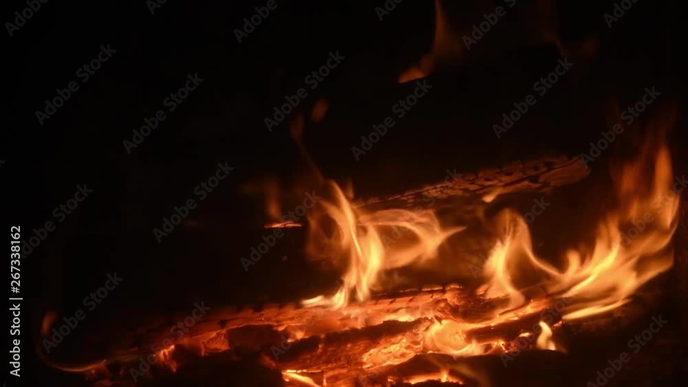 uncovered fire in the fireplace. burning wood close up uncovered fire in the fireplace. burning wood close up