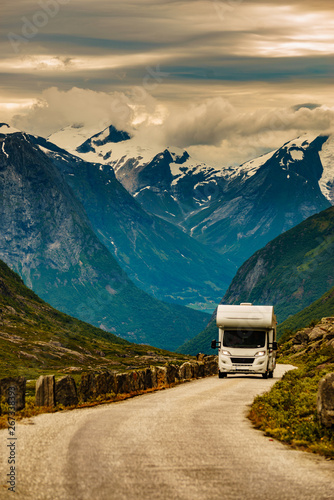 Camper car in norwegian mountains photo