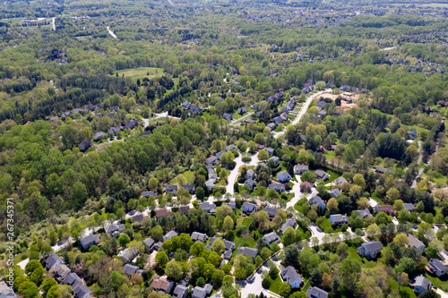 upper middle class american neighborhood with curving street in Maryland