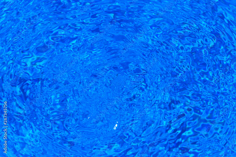 Blue ripped water in swimming pool