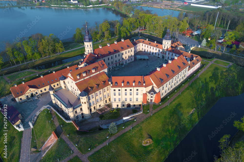 The old Nesvizh Castle close-up on a sunny April morning (aerial photography). Nesvizh, Belarus