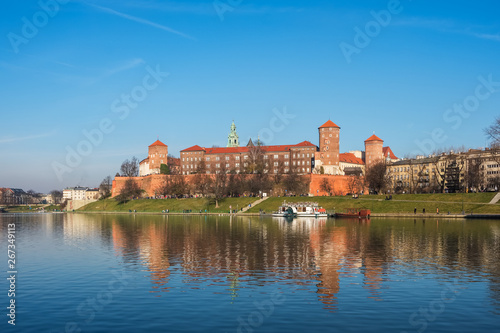 Wawel castle on bank of Vistula river in Krakow
