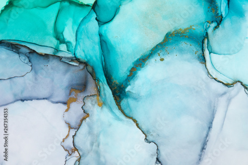 Alcohol ink sea texture. Contemporary art. Spots of oil paint. Abstract art background. Multicolored bright texture. Fragment of artwork. Modern art. Inspired by the sky, as well as steam and smoke.