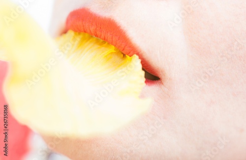 Wallpaper Mural Red woman's lips with the yellow petal. Torontodigital.ca