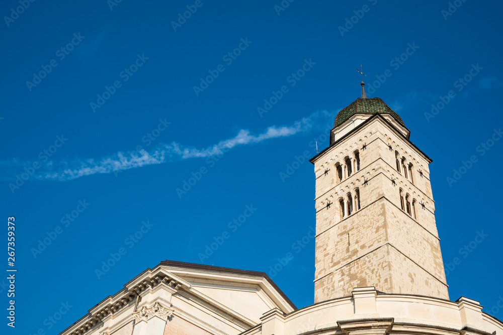 tower of Church santa maria maggiore Trento, Italy, against blue sky. Copy space