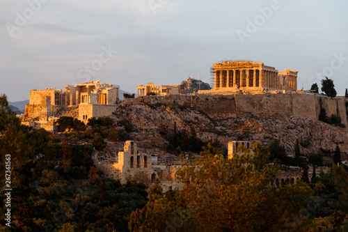 Panoramic view of the Acropolis of Athens during sunset as seen from a lookout on Filopappou Hill (Athens, Greece, Europe)