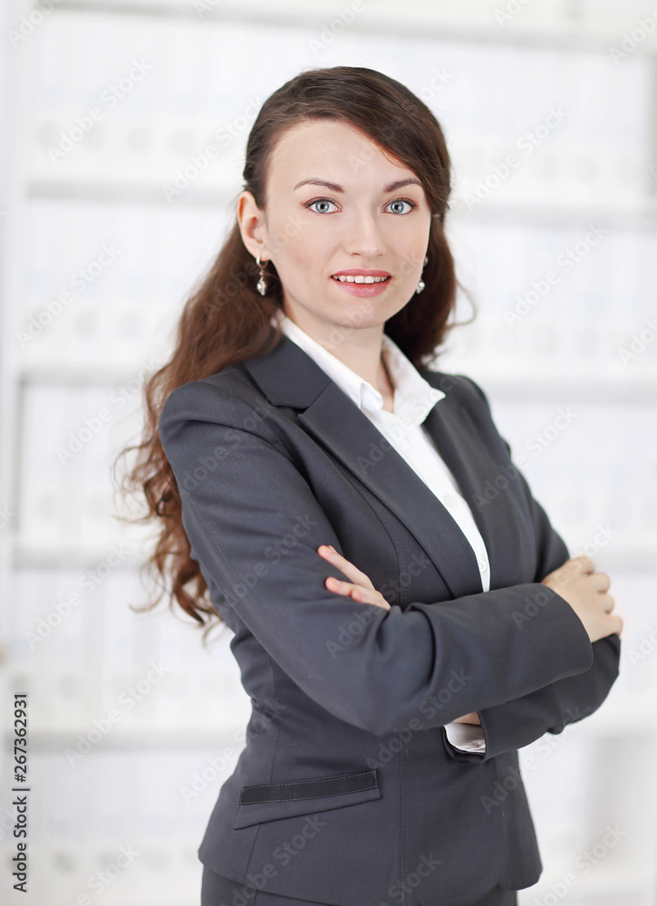 portrait of young business woman on the background of the office portrait of young business woman on the background of the office