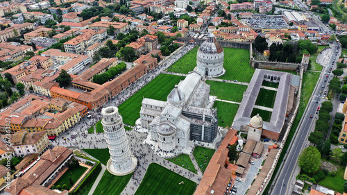 Aerial view of the Square of Miracles with Pisa’s Leaning Tower, Cathedral of Santa Maria Assunta and Baptistery in Pisa, Tuscany, Italy.