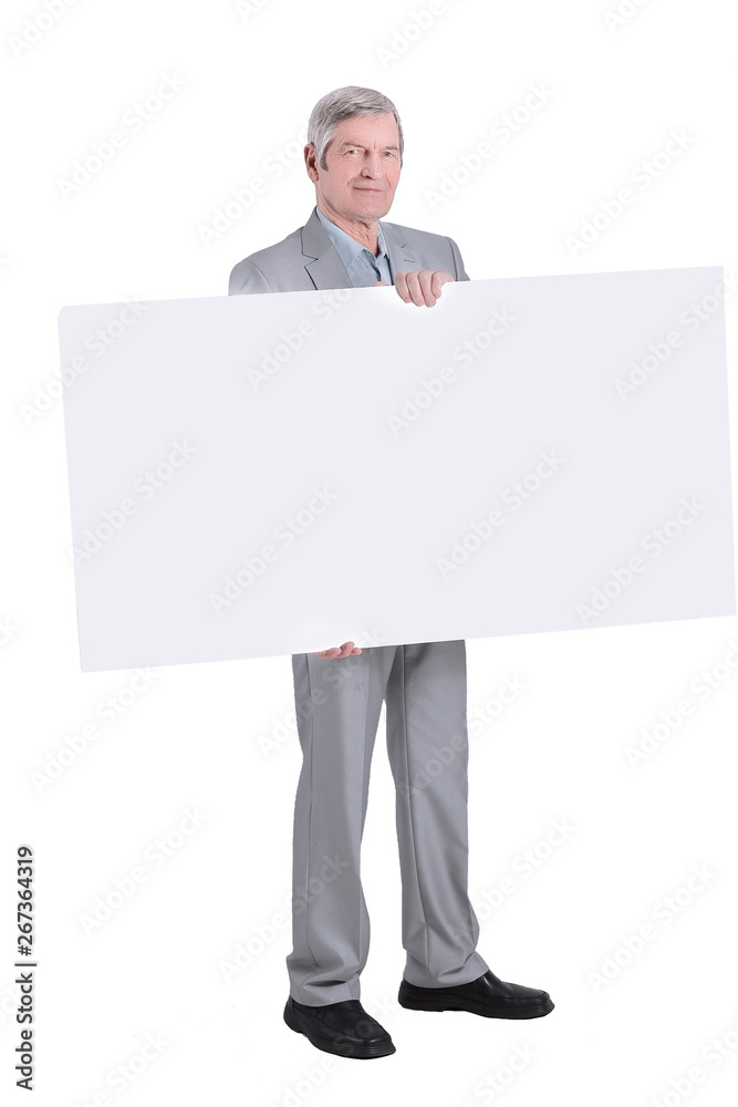serious Mature businessman showing blank placard.isolated on a white serious Mature businessman showing blank placard.isolated on a white