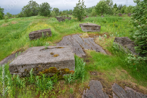 Old foundation of the destroyed building on the stone coast of the White Sea in the vicinity of the village Rabocheostrovsk, Popov Island, Kemsky District, Republic of Karelia, Russia