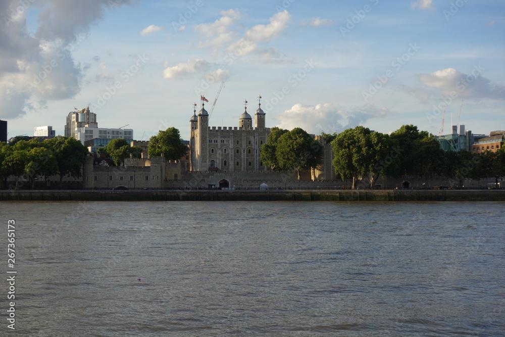 Naklejka premium The Tower of London, officially Her Majesty's Royal Palace and Fortress of the Tower of London, is a historic castle located on the north bank of the River Thames in central London.