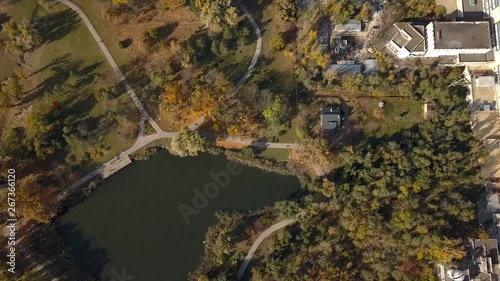 Top down view of Chisinau, Dendrariu, Kishinev greenery, body of water and some residential white buildings photo