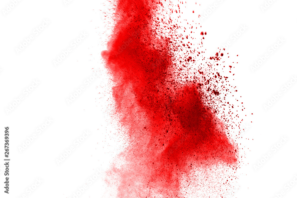 Freeze motion of red powder exploding, isolated on white background. Abstract design of red dust cloud. Particles explosion screen saver, wallpaper