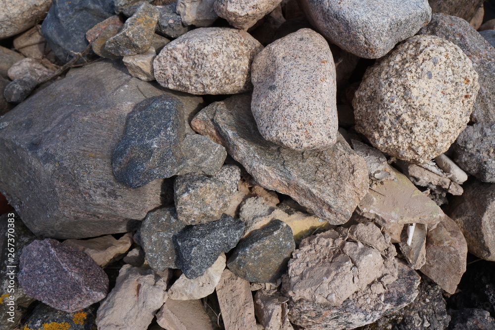 large and small stones in a pile large and small stones in a pile