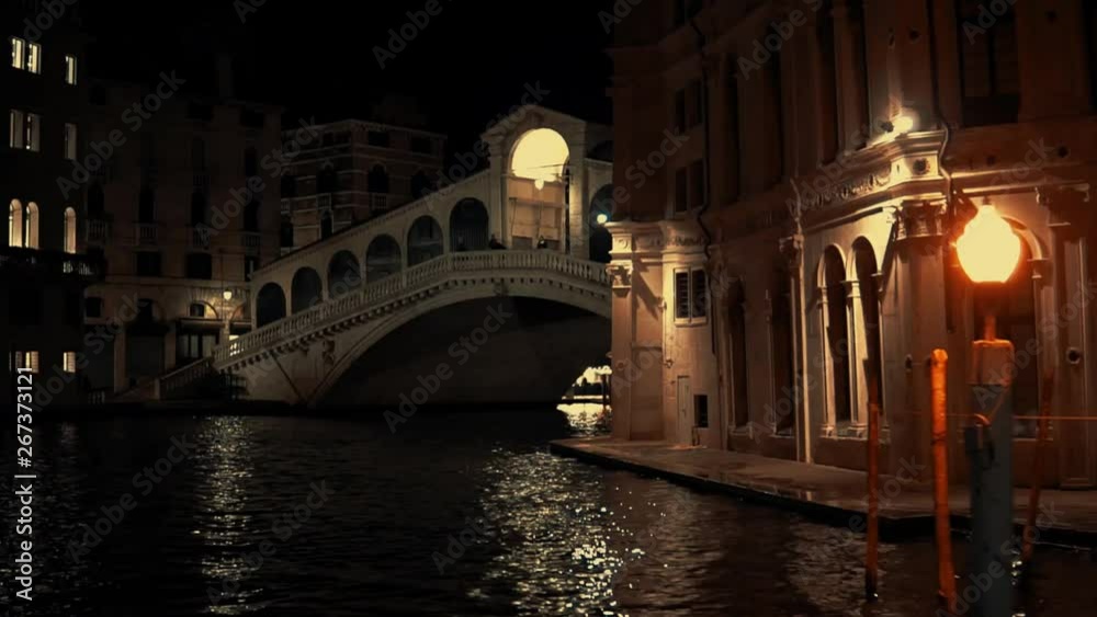 Rialto Bridge at dark night. View of Grand Canal, Venice. Beautiful panorama.