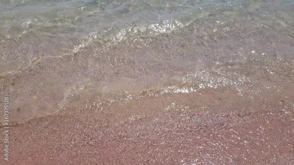 surf on the sea. calm sea waves near the sandy shore surf on the sea. calm sea waves near the sandy shore