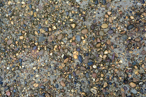 gravels and rocks on the deterioration of old cement ground from long time used