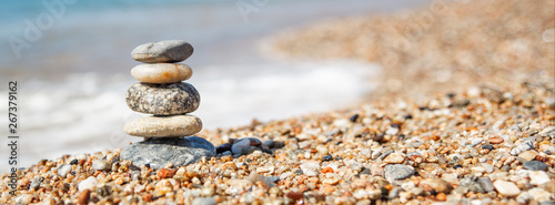 Photography Balance of stones on the beach, sunny day