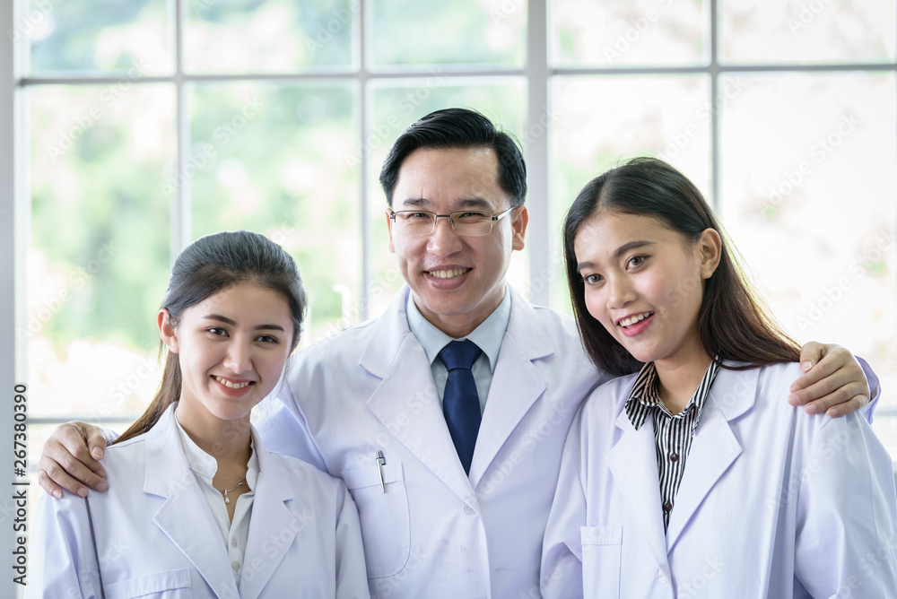 Asian scientist and researching team has in laboratory. Asian scientist and researching team has in laboratory.