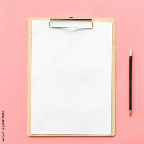 Blank clipboard and pencil mock up on pink pastel color background