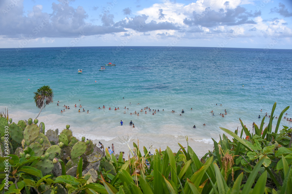 HIGH ANGLE VIEW OF PEOPLE ENJOYING ON BEACH HIGH ANGLE VIEW OF PEOPLE ENJOYING ON BEACH