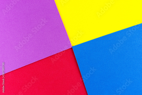 Blue, red, purple, yellow, gradient color with texture from real foam sponge paper for background, backdrop or design.