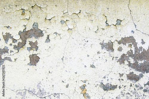 old white cracked paint on the cement wall background
