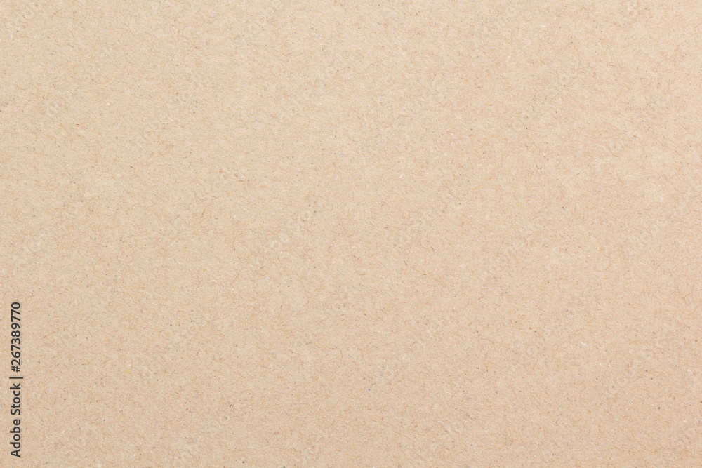 Brown paper background. Empty cardboard texture. Craft sheet Brown paper background. Empty cardboard texture. Craft sheet