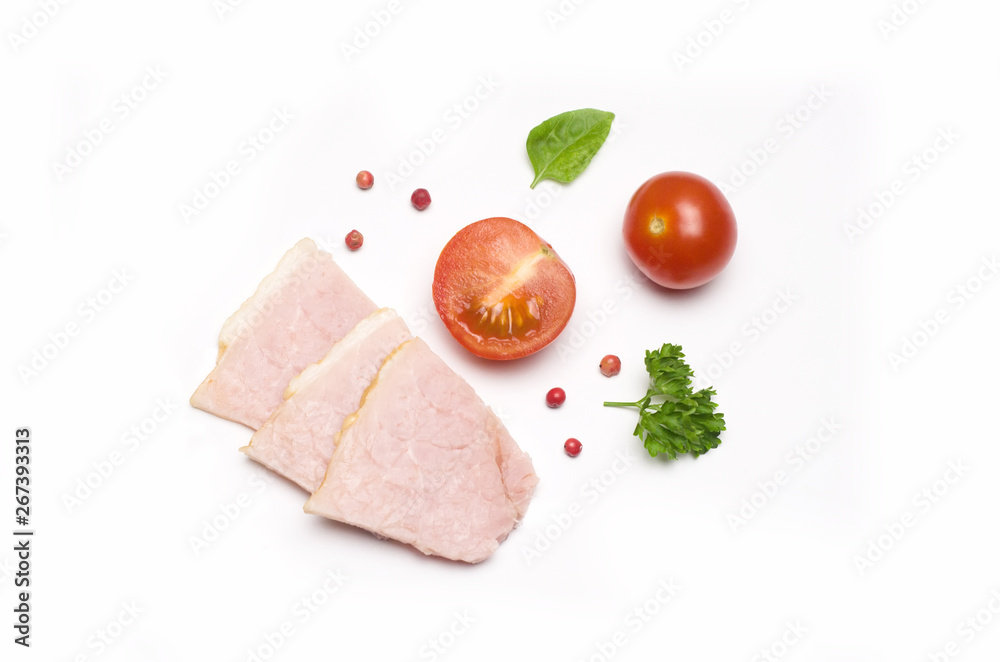 slices of pork and sliced tomato and next parsley and red pepper peas
