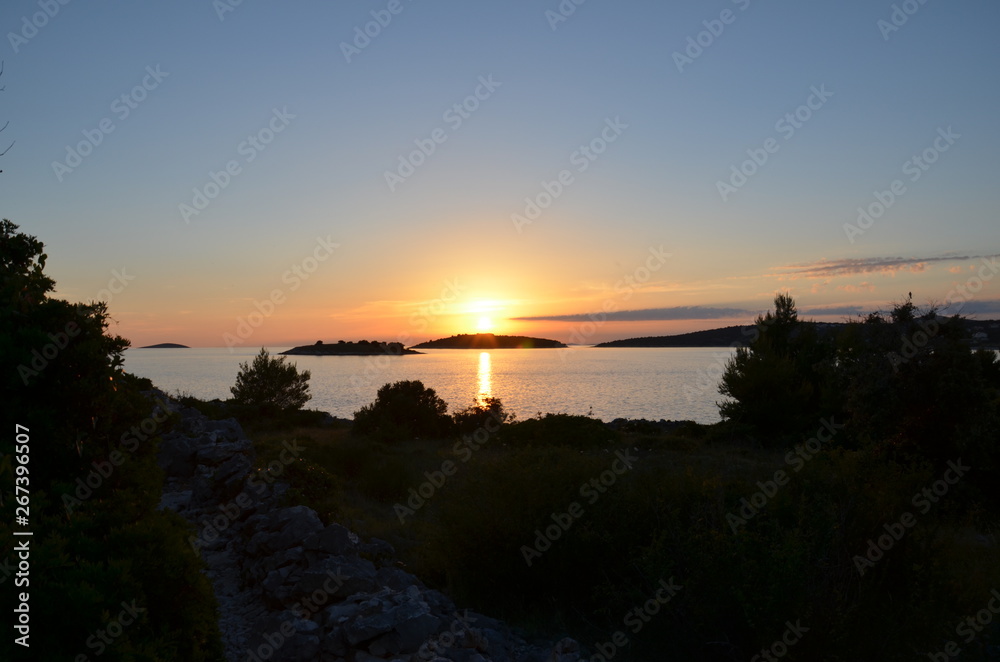 sunset on the beach and tropical island