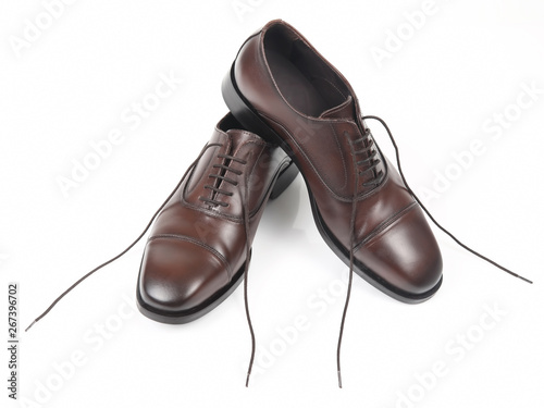 Classic men's brown shoes on white background. Leather shoes