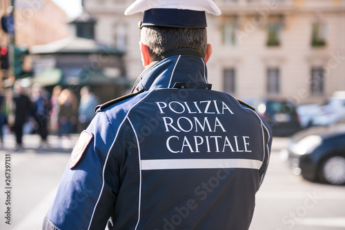 Police officer on duty on the street of Rome city