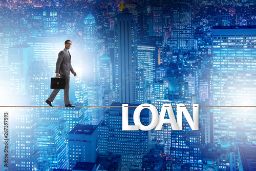 Debt and loan concept with businessman walking on tight rope © Elnur