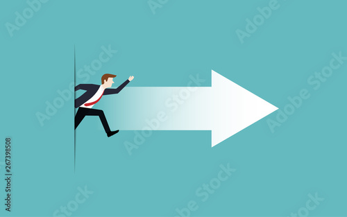 Businessman jumping out of paper cutout