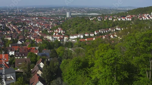 Aerial around the Gaisburg hill in spring  in Stuttgart, Germany. Ascending from the hill with view of Stuttgart. photo