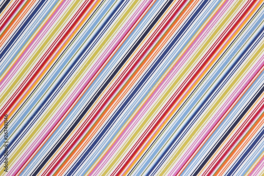 The background texture of the fabric in a colored diagonal strip The background texture of the fabric in a colored diagonal strip
