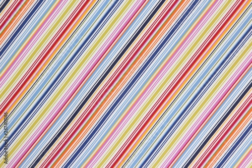 The background texture of the fabric in a colored diagonal strip