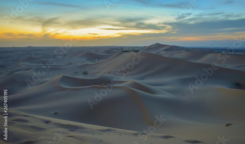 Endless desert sand dunes at sunset near Abu Dhabi