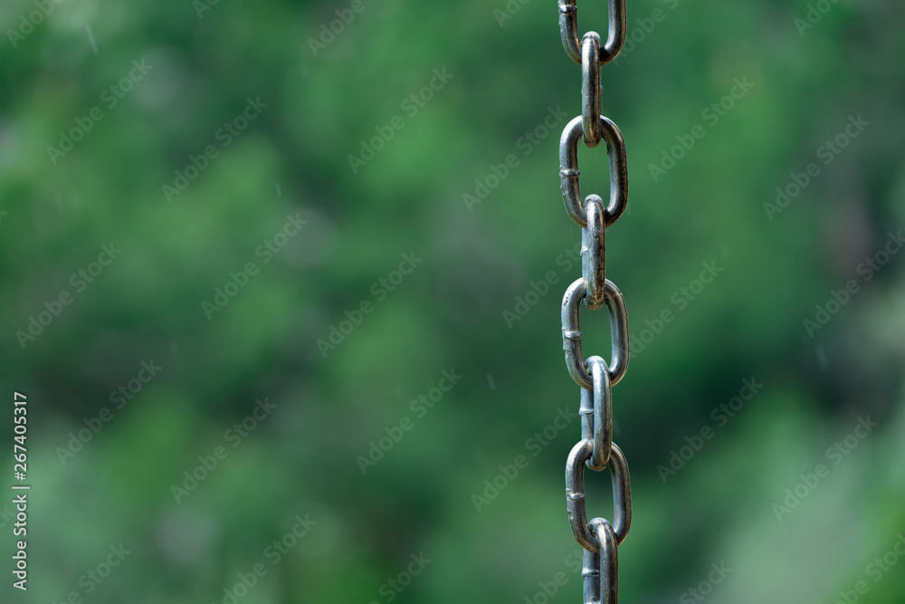 metal chain on green background metal chain on green background