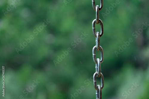 metal chain on green background