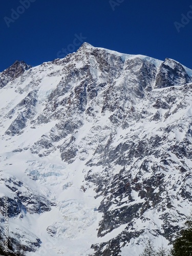 View of Monte Rosa on a sunny day near the village of Macugnaga, Italy - April 2019