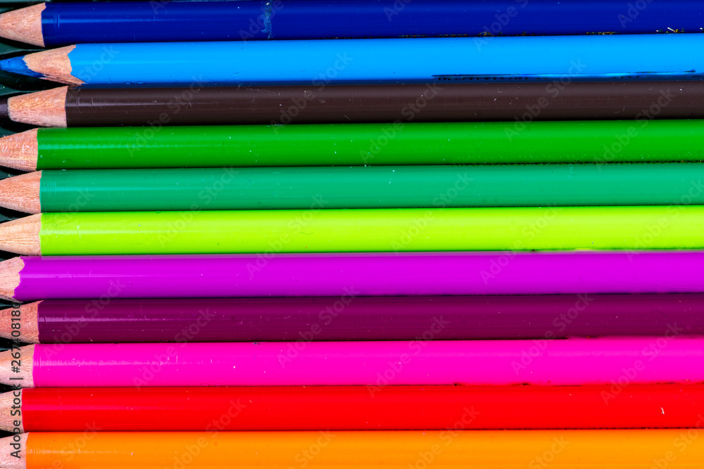 many colorful wooden pencils in very beautiful bright colors side by side many colorful wooden pencils in very beautiful bright colors side by side