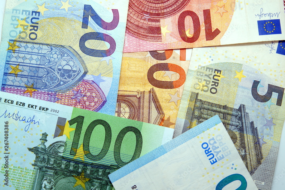 pile of paper euro banknotes as part of the european payment system. Euro money banknote, business and finance concept pile of paper euro banknotes as part of the european payment system. Euro money banknote, business and finance concept