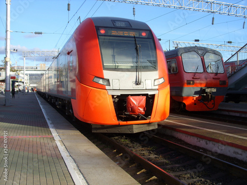 two trains standing at the station