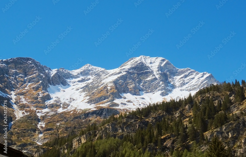 View of the Italian Alps on a sunny day near the town of Macugnaga - April 2019 View of the Italian Alps on a sunny day near the town of Macugnaga - April 2019