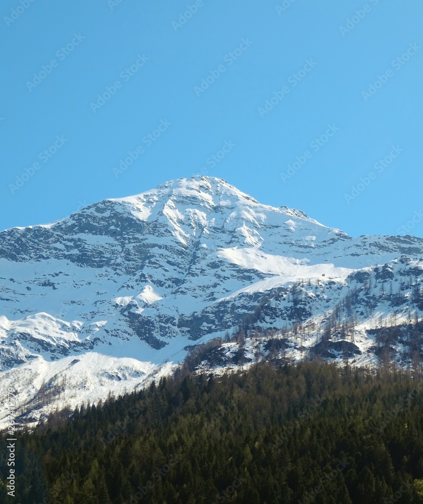 View of the Italian Alps on a sunny day near the town of Macugnaga - April 2019 View of the Italian Alps on a sunny day near the town of Macugnaga - April 2019